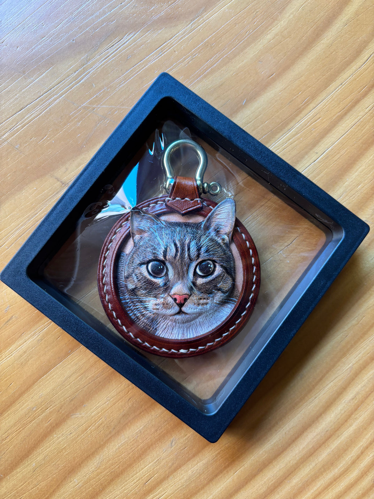 Custom cat leather portrait keychain in a protective gift display case